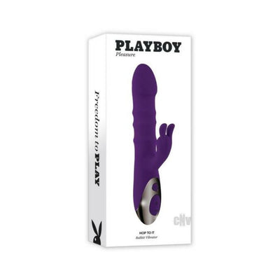 Purple Playboy Hop To It rechargeable dual stimulation rabbit vibrator with ergonomic controls on white packaging box.