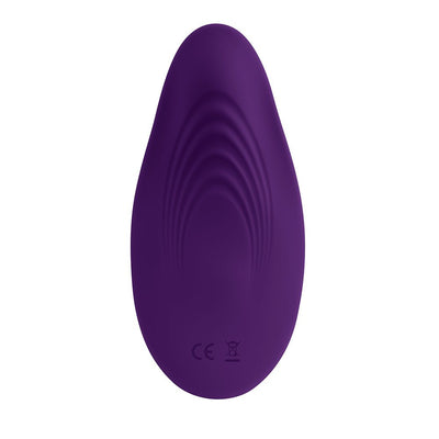 Purple silicone wearable vibrator with textured curved design, compact and discreet for remote-controlled use.