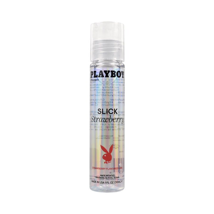 Bottle of Playboy Slick water-based strawberry flavored lubricant with clear packaging and red logo.