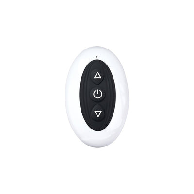 White oval remote control with black buttons for adjusting vibration settings on a rechargeable silicone cockring.