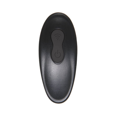 Black ergonomic remote control with power and wireless buttons for vibrating silicone cockring.