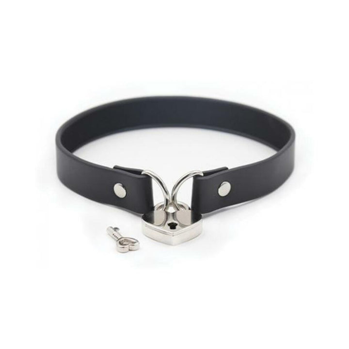 Black PVC collar with silver heart-shaped lock and matching key on a white background.