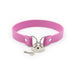 Pink PVC collar with silver heart-shaped lock and matching key on white background