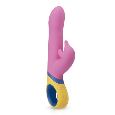 Pink silicone dolphin vibrator with yellow and blue ergonomic handle and control buttons on white background.