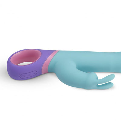 Teal silicone rabbit vibrator with purple and pink ergonomic handle and dual stimulation design.