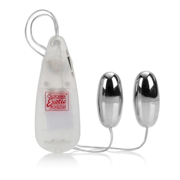 Compact dual silver bullet vibrator with clear wired controller and adjustable speed dial by California Exotic Novelties.