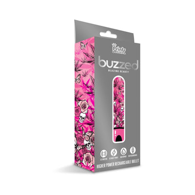 Packaging box of Prints Charming Buzzed rechargeable bullet vibrator in pink with cannabis leaf and skull design.
