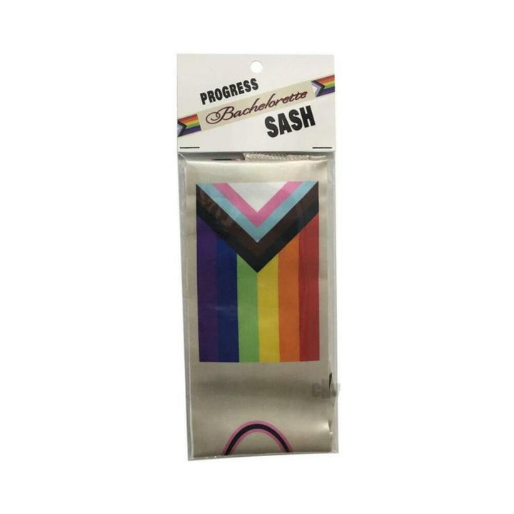 Packaged Progress Pride Flag bachelorette sash with vibrant rainbow and inclusive colors on white background.