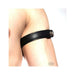 Black leather adjustable bicep band with press stud fastener worn on upper arm.