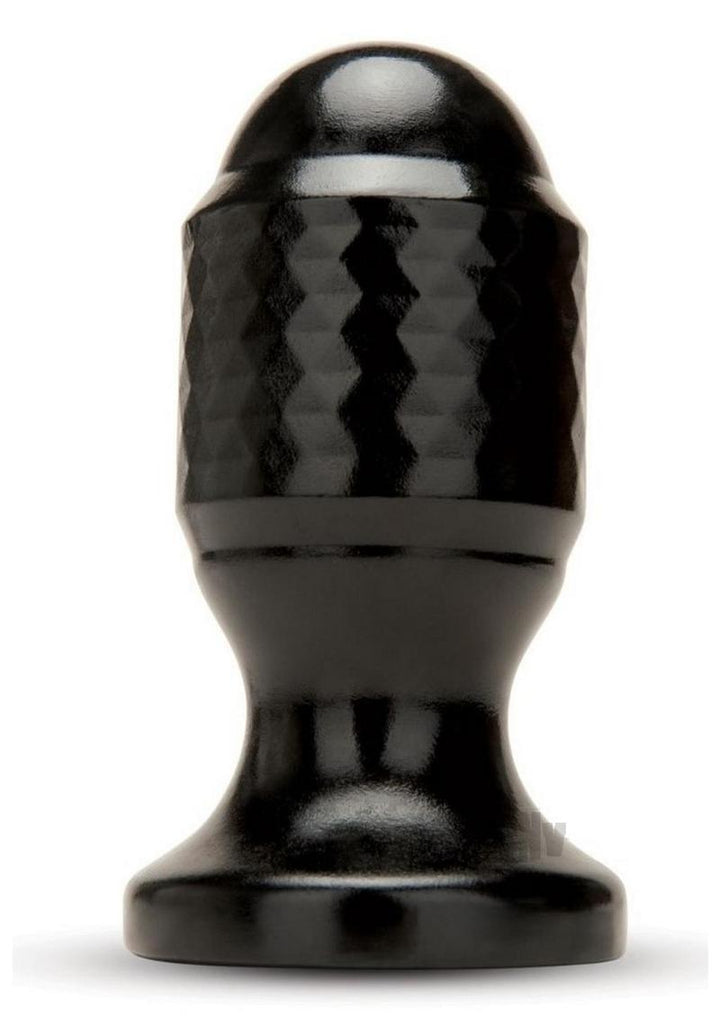 Black anal plug with textured diamond pattern and flared base for secure, comfortable wear.