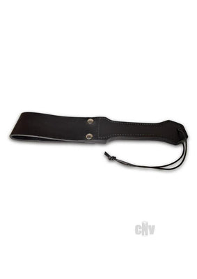Black leather paddle with stitched handle and wrist strap, designed for intimate sensory play.