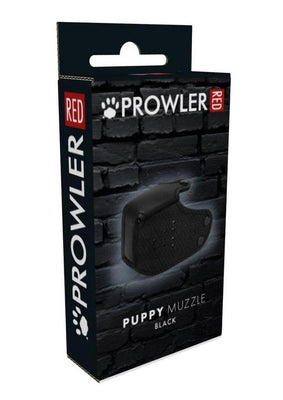 Packaging box for Prowler Red black puppy muzzle with textured design on a dark brick background.
