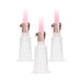 Medium-sized clear silicone pump cups with rose gold connectors and pink tubing for clitoral and nipple stimulation.