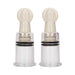 Pair of transparent medium-sized nipple suction cups with beige twist tops for adjustable stimulation.