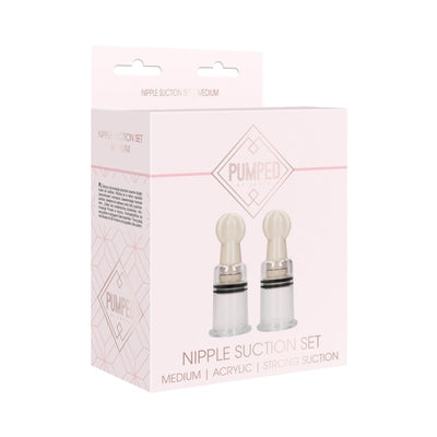 Pumped medium nipple suction set in rose packaging with two clear acrylic suction cups for enhanced sensation.