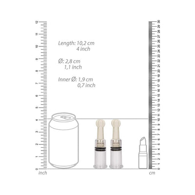 Small transparent nipple suction cups with measurement scale and size comparison to a soda can and lipstick.