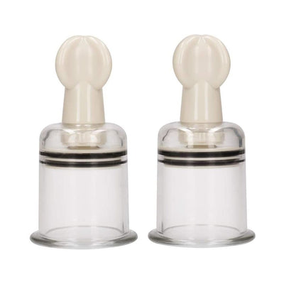 Pair of large transparent nipple suction cups with beige twist tops for adjustable stimulation