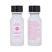 Two frosted glass bottles of Pure Instinct pheromone-infused perfume oil for her, 0.5 fl oz, with black caps and pink text.