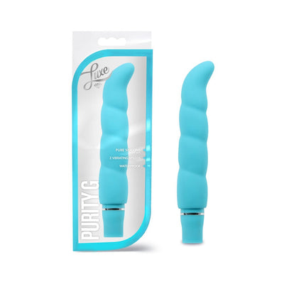 Blue silicone Purity G vibrator with ergonomic curve and spiral texture shown inside and outside packaging.