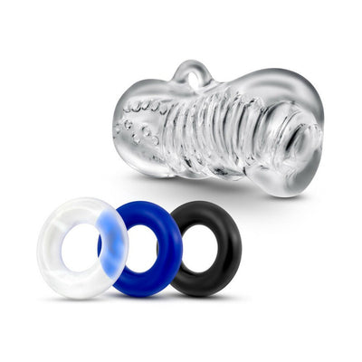 Clear textured stroker sleeve with three silicone cock rings in clear, blue, and black colors.
