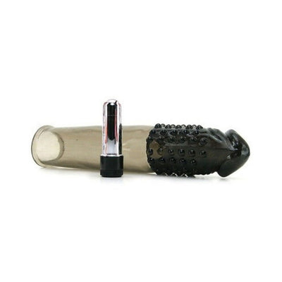 Black ribbed vibrating penis extender sleeve with a clear flexible base and a removable silver bullet vibrator.