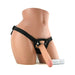Flesh-toned 7-inch realistic dong attached to adjustable black universal strap-on harness on mannequin torso.