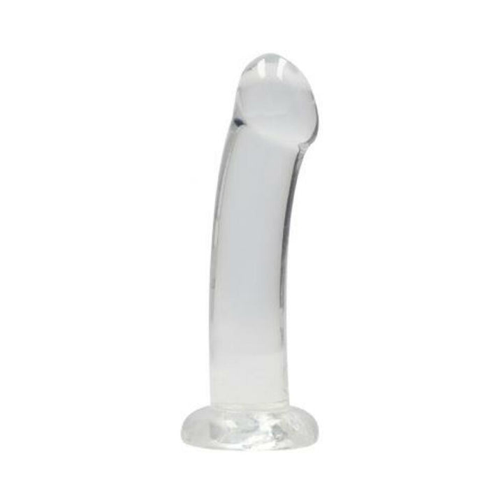 Crystal clear curved dildo with suction cup base for hands-free use, made from smooth, body-safe material.