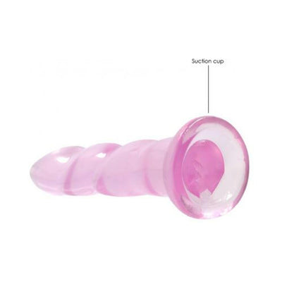 Pink crystal clear non-realistic dildo with a suction cup base for hands-free use.