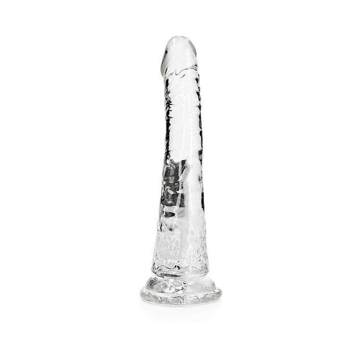 Clear slim 7-inch dildo with suction cup base, realistic texture, and smooth tapered tip for versatile use.