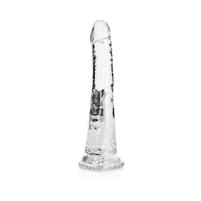 Clear slim 7-inch dildo with suction cup base, realistic texture, and smooth tapered tip for versatile use.