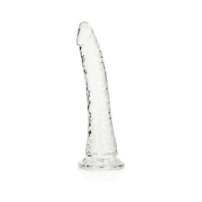 Clear slim 7-inch dildo with suction cup base, textured for realistic feel and hands-free use.