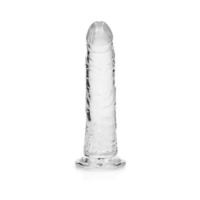 Clear slim 7-inch dildo with suction cup base, realistic texture, and smooth, transparent design.