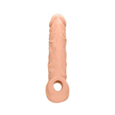 Realrock 8-inch flesh-tone penis sleeve with textured surface and strap hole for secure fit.