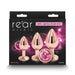 Rear Assets 3-piece rose gold metal plug kit with graduated sizes and pink gem detail on black packaging.
