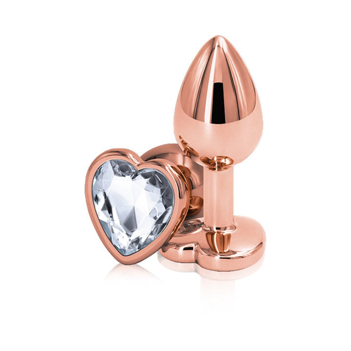 Rose gold metal anal plug with a heart-shaped clear gem base, small size, polished chrome finish.