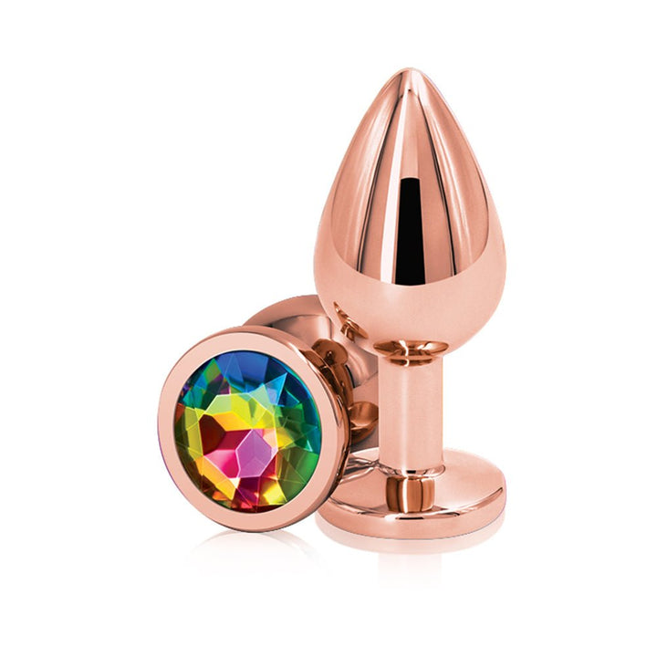 Rose gold medium-sized metal butt plug with a colorful rainbow gem base on a white background.