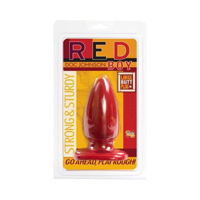 Red Boy large red butt plug in clear packaging with yellow and red label, strong and sturdy design by Doc Johnson.