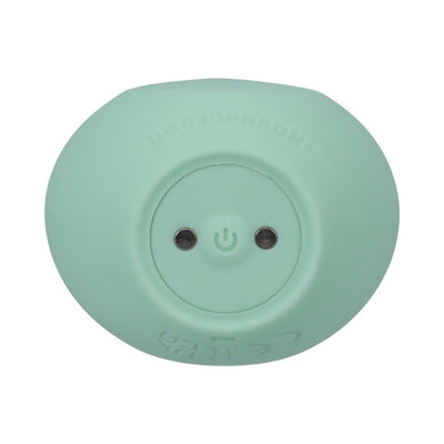 Mint green rechargeable silicone clitoral vibrator with power button and magnetic charging ports.