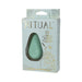 Mint green teardrop-shaped silicone clitoral vibrator in light blue packaging with gold accents and branding.