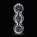 Clear textured dual-chamber silicone toy with raised nubs and ribbed middle section on black background.