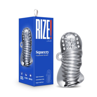 Clear textured ergonomic stroker with multi-textured chambers and convenient grip next to its blue RIZE! Squeezy packaging box.