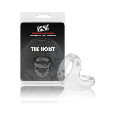 Clear flexible Rock Solid The Hoist cock ring with packaging showing product name and features.