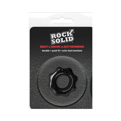 Rock Solid Gear black stretchy C ring with ridged design in clear clamshell packaging on textured black background.