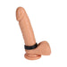 Black stretchy cock ring displayed on a realistic flesh-toned silicone model with suction base.