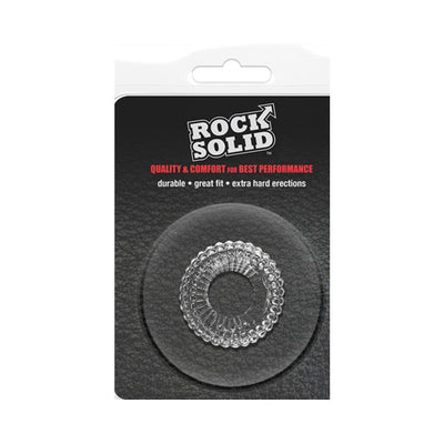 Clear textured stretchy ring in black and white Rock Solid packaging with product benefits listed.