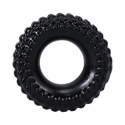Black flexible ring with textured ridges and a smooth inner circle, designed for comfort and stretch.