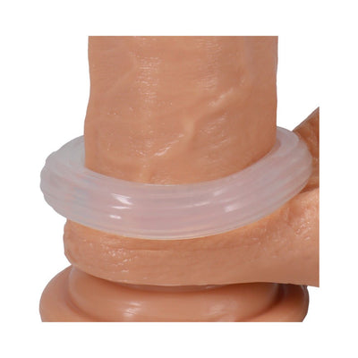 Clear ribbed silicone ring displayed on a realistic skin-toned model for size and fit demonstration.
