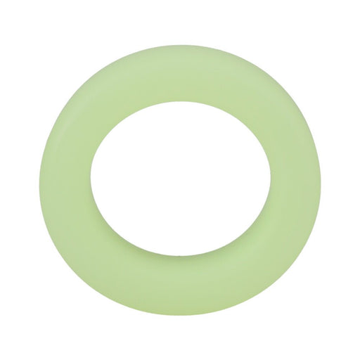 Glow-in-the-dark soft green silicone cylinder-shaped ring with smooth finish and rounded edges.