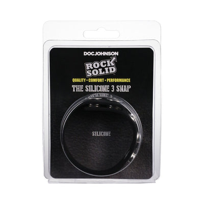 Black adjustable silicone ring with 3 snap closures in clear retail packaging by Doc Johnson Rock Solid.