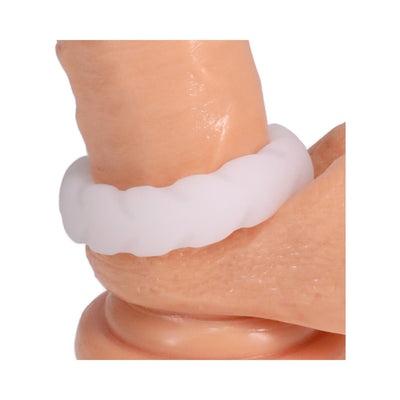 Close-up of a white Silaflex Fat Tire ring designed for comfort and stretchability on a skin-toned model.